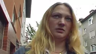 A chubby German slut with blonde hair riding a long pecker