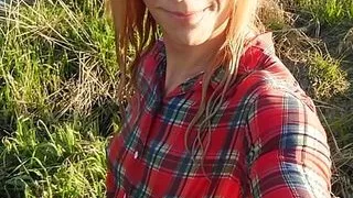 Swimming in jeans and shirt in river.