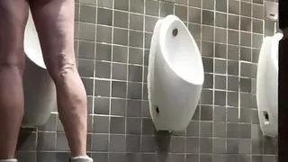 Naked in public toilet