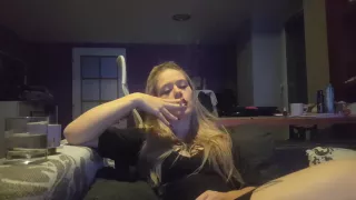 Reading A Book And Smoking Cigarette