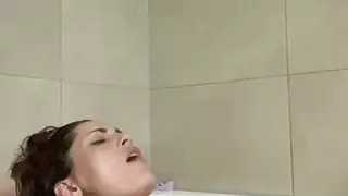 She is playing in her bath