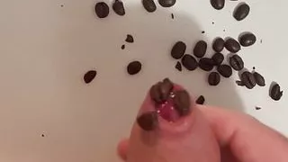 coffee beans under foreskin  jerking off