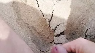 stepfather looks at his naked stepdaughter on the beach and plays with his cock at the sight of her.