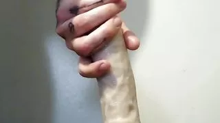 Riding a dildo