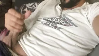 Bearded guy having fun jerking off and cumming a lot