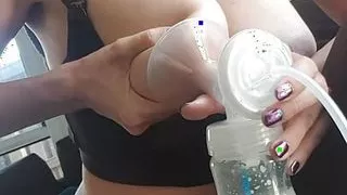 Squeezing tits really hard. Watch the milk flow