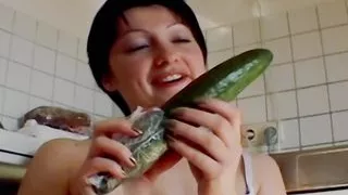 Small titted German chick sucking a cock and playing with a cucumber