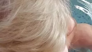 Wanking off in the hot tub over my tits