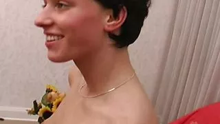 A slim German babe gets her small boobs sprayed with cum