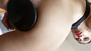 Masturbating with huge plug in her ass