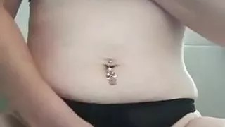 Girl masturbating in the bathroom and fingers her pussy