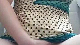 Fucking a dildo under my dress I get excited in the bathroom