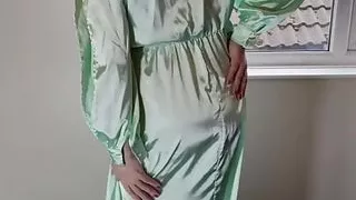 television  crossdresser in green satin dress