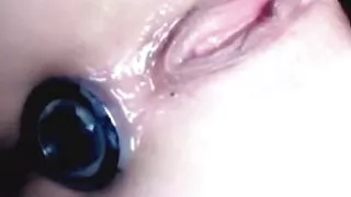 Very horny girl having orgasm creaming with butt plug inside ass