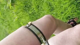 Fag pup outdoors in his chastity belt