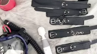 Fejira com Duct-taped woman in shiny leather jacket and swimsuit