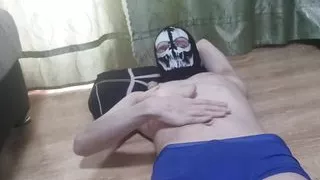 The guy in the mask made a show with oil. Oil massage. Oil masturbation.