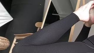 barefoot stretching in tight leggings