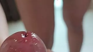 My girlfriend jerks off my oiled dick with her hands