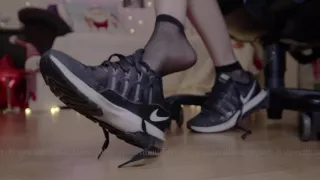 Dangling Nike Sneakers