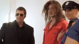 A pair of sexy blondes with big boobs, wearing provocative thigh-high fishnet stockings and erotic costumes