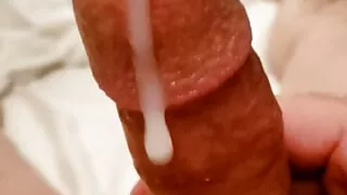 Close up cum oozing down my dick