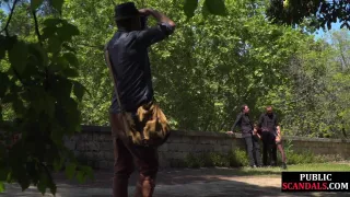 Public babe deepthroating outdoor while spanked in 3some