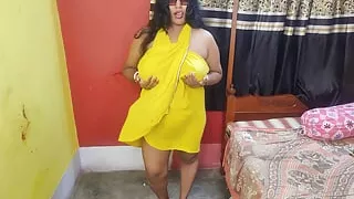 Sexy Bengali Bhabi fucking with Cucumber in her bedroom in yellow dress
