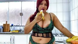 Big Boobs babe fucks herself in the kitchen till she squirts