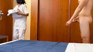 I surprise the cleaning girl from the hotel room service and she helps me finish cumming by giving me a blowjob
