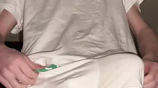 The handsome man slowly pulls off his underpants and pulls out a 23 cm penis