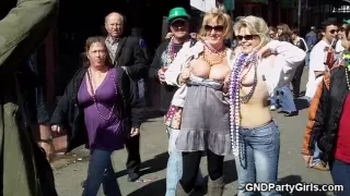 Two moms flash at mardi gras - GNDPartyGirls