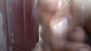 Young twink jerks off in front of the mirror.