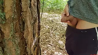 Pissed on the tree. Naked walk in the woods