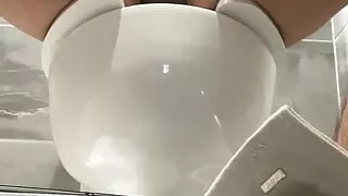 Jacking off in the bath room at work