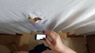 stepmom sucks cock through a hole and gets a portion of cum in her mouth