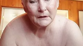 Nasty Granny Showing Off Her Fat Pussy As She Rubs It With A Dildo