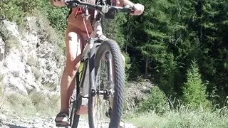 stretching the nipples naked on a byke ride