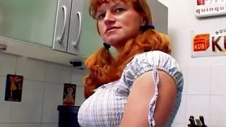 A curvy German babe gets her asshole smashed in the kitchen