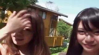 Two Japanese Teen Babes Take Turns with Cock