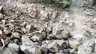 Teen piss next to warerfall