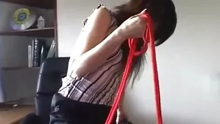 Japanese Nylon Miss domiante her tied up slave with her nylon feet and nylon ass.