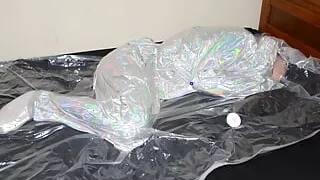 Dec 18 2022 - VacPacked in Mr Riegillio shiny PVC tracksuit with PVC aprons & face shield