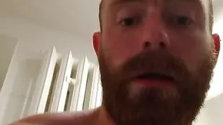 Muscular fitness bodybuilder is cleaning body taking shower and doing muscle worship