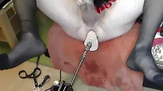 Crossdresser in corsage with skirt and stockings gets his anal pussy creamy fucked by sexmaschine until cumshot
