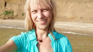 Alexa Cosmic transgirl swimming in the sea first time in teal combi dress