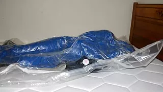 Dec 11 2022 - VacPacked in slvrbrboy1s coveralls in my PVC sleepsack with his shirt & my PVC face shield