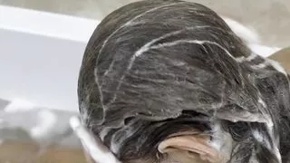 Hair washing in the bath