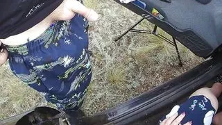 the bitch sits in the car and jerks off my dick in nature until I cum