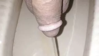 Pissing handjob guy in bathroom toady